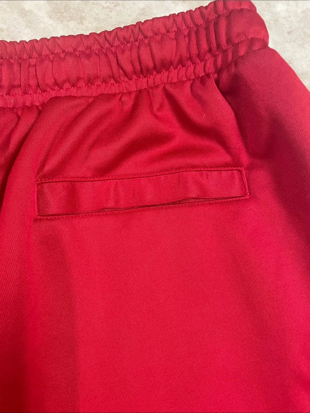 Jordan mens Red Track Joggers with Black Side Logo Tape XL